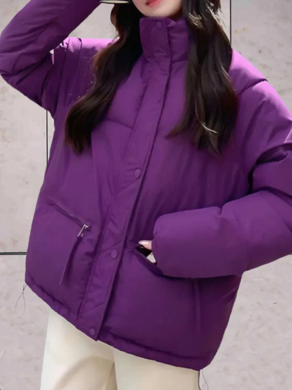 Dana parka featuring a stand-up collar and double closure