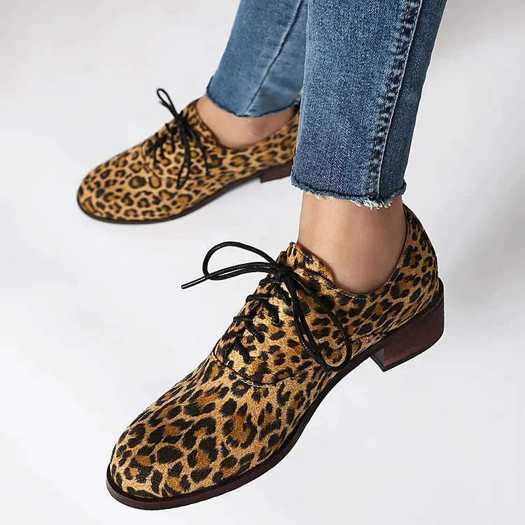 Oxfords con punta tonda, tacco basso e lacci, patchwork con stampa leopardata 
